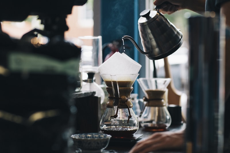 Barista inspecting freshly roasted coffee beans