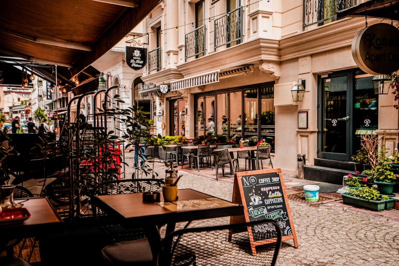 Charming café exterior storefront with warm welcoming lights